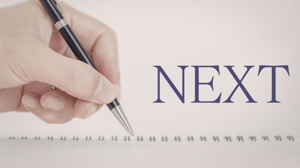 ノートに「次へ」と書いている手元の写真
